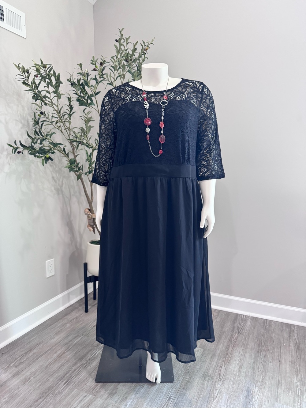 BloomChic Black Lace Maxi Dress with Sheer Skirt